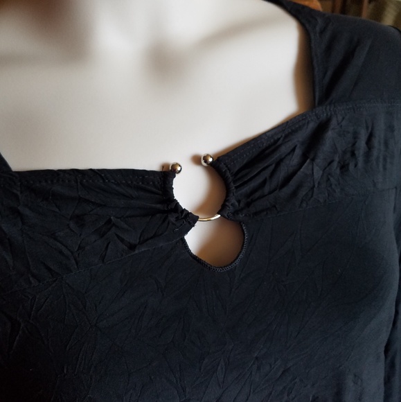 Snazzy black top by Express U with metal embellishment - Picture 1 of 4